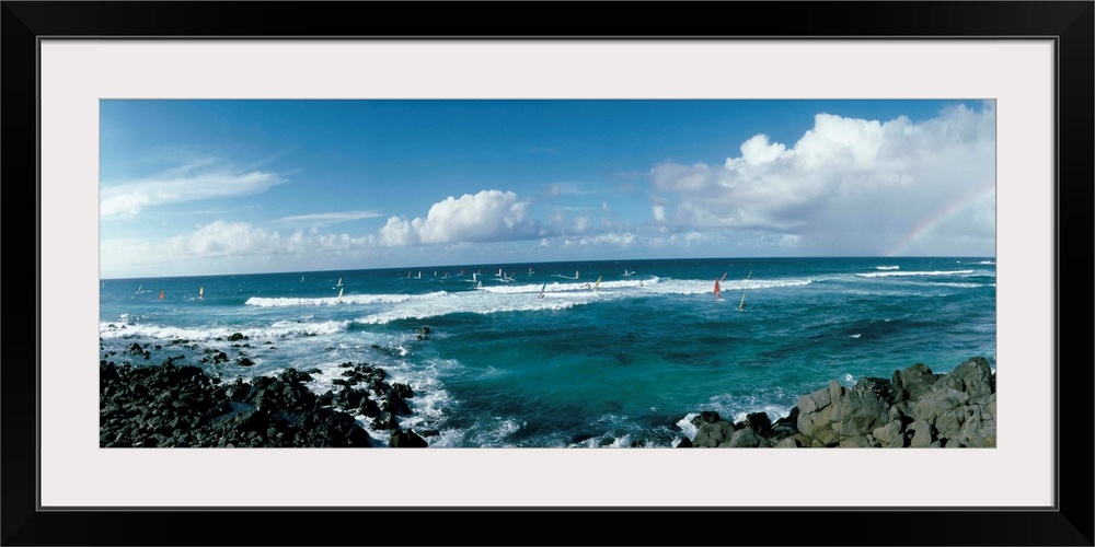 Tourists windsurfing in an ocean, California, USA