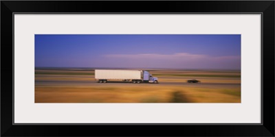 Truck and a car moving on a highway, Highway 5, California