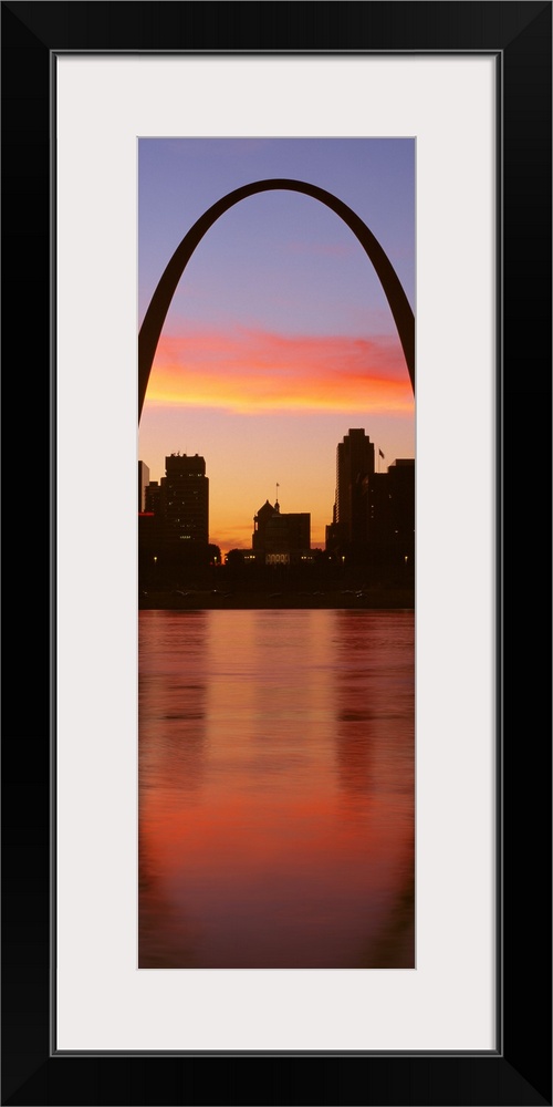 Vertical photograph on a big canvas of the Gateway Arch over St. Louis, Missouri, at sunrise.