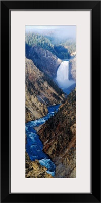 Waterfall falling into stream through a canyon, Yellowstone National Park, Wyoming