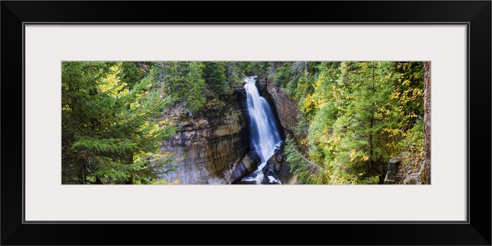 Waterfall in a forest, Miners Falls, Rocks National Lakeshore, Michigan