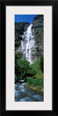 Waterfall in a forest Murrenbach Falls Lauterbrunnen Valley Bernese Oberland Berne Canton Switzerland