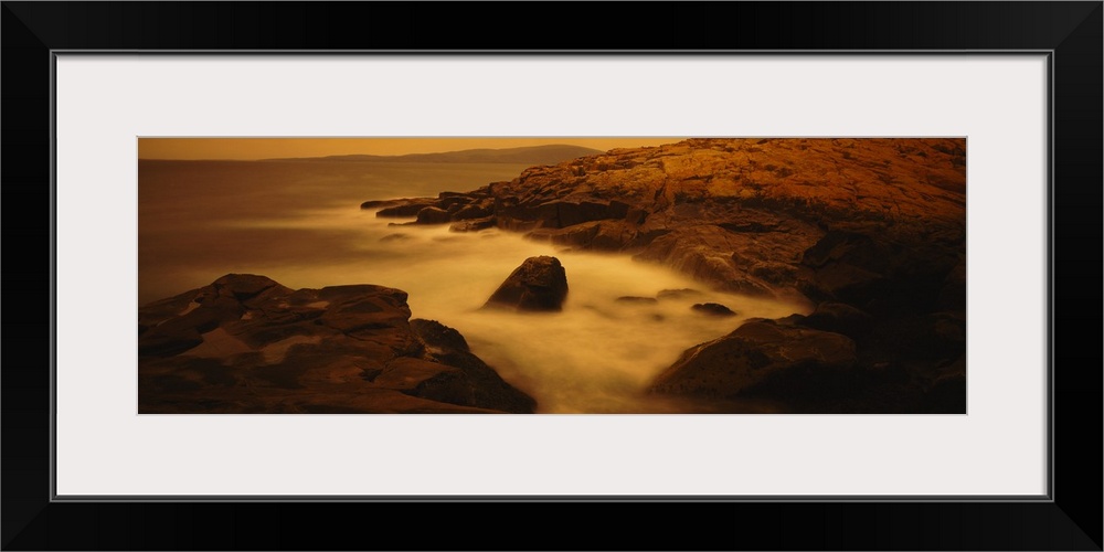 Large photograph of misty waters surrounding rocks in the Acadia National Park on the Schoodic Peninsula in Maine (ME).