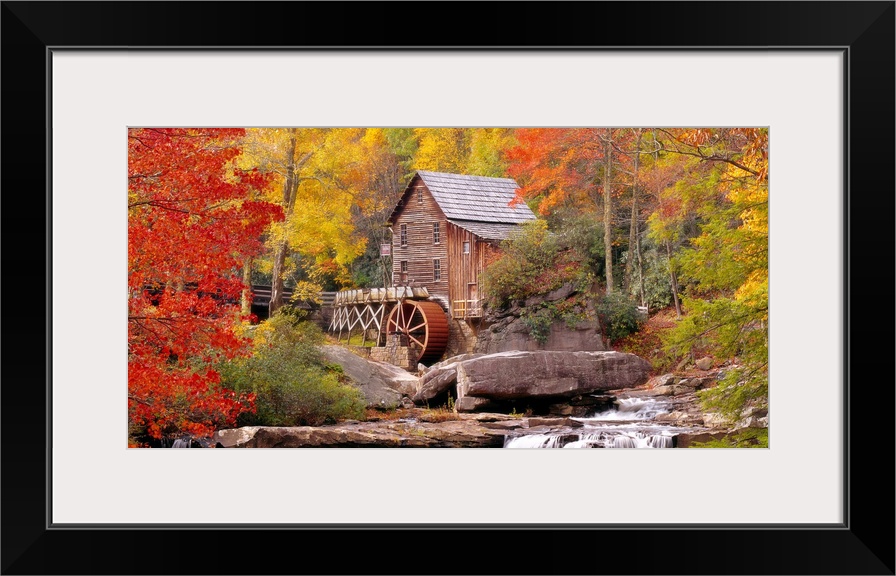 Panoramic photograph of the Glade Creek Grist Mill located within Babcock State Park in West Virginia.  The waterfall in t...