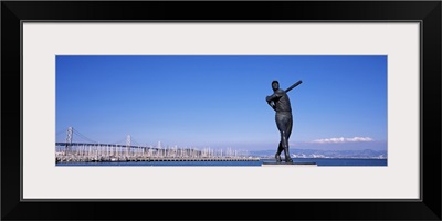 Willie McCovey statue with bridge in the background ATT Park Bay Bridge San Francisco California