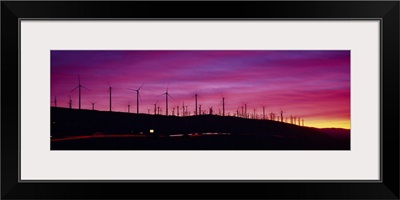Wind turbines in a row at dusk, Palm Springs, California