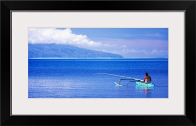 Woman in Canoe Fishing Tahiti