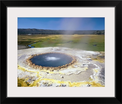 Wyoming, Yellowstone National Park, Lower Geyser Basin, Steam erupting from the natural geyser