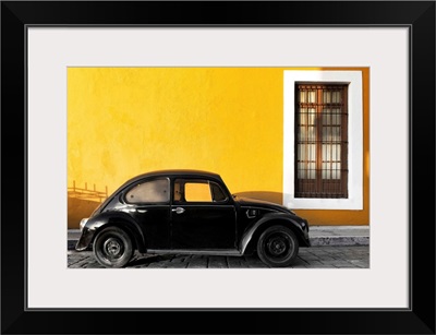 Black VW Beetle Car with Gold Street Wall