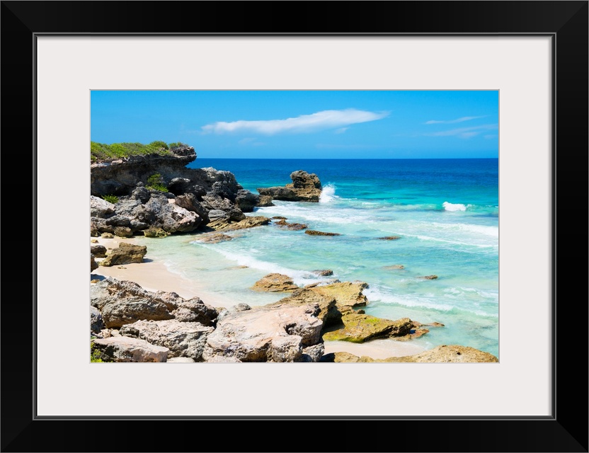 Photograph of the rocky beach on Isla Mujeres, Mexico. From the Viva Mexico Collection.
