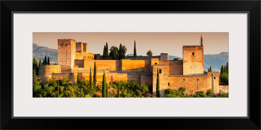 It's a view of the Alhambra of Granada in Andalusia at sunset (Spain).