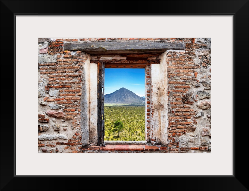 View of the Mexican desert with a mountain in the background framed through a stony, brick window. From the Viva Mexico Wi...