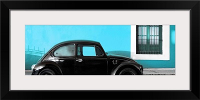 The Black VW Beetle Car with Turquoise Wall