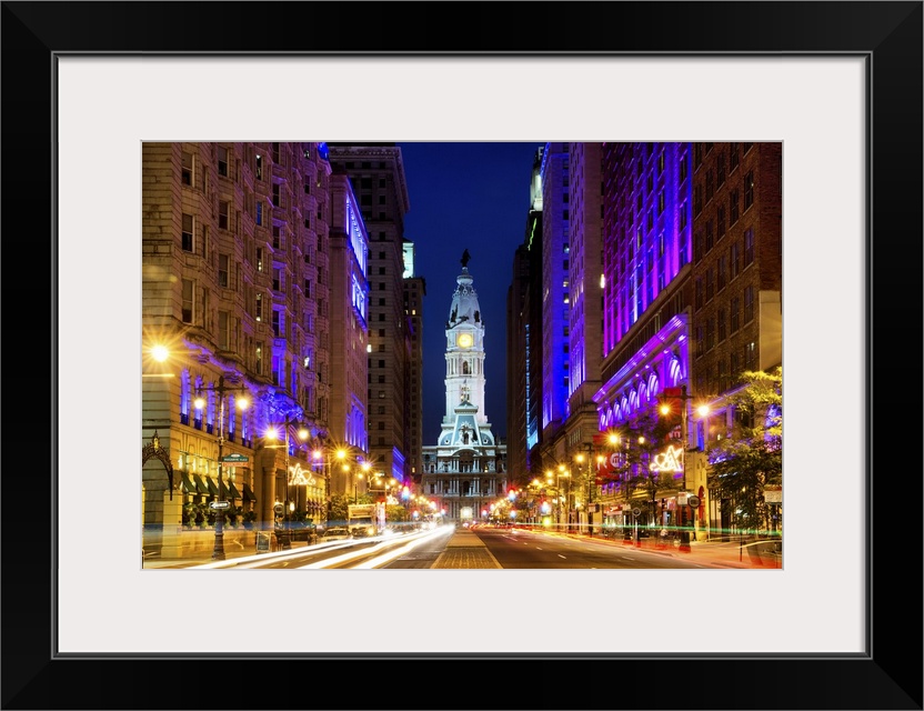 Fine art photograph of City Hall in Philadelphia in the evening, with light trails in the street.