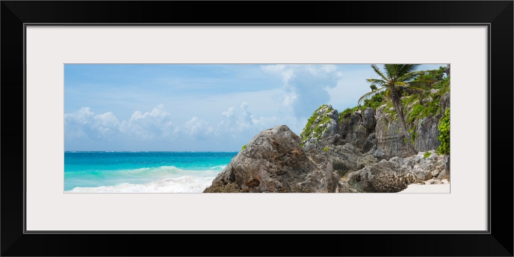 Panoramic photograph of a rocky Caribbean beach shore in Tulum, Mexico. From the Viva Mexico Panoramic Collection.