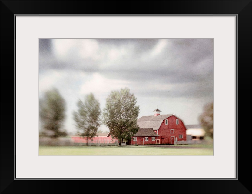 Pictorialist photo of a big red horse barn on a Canadian farm.