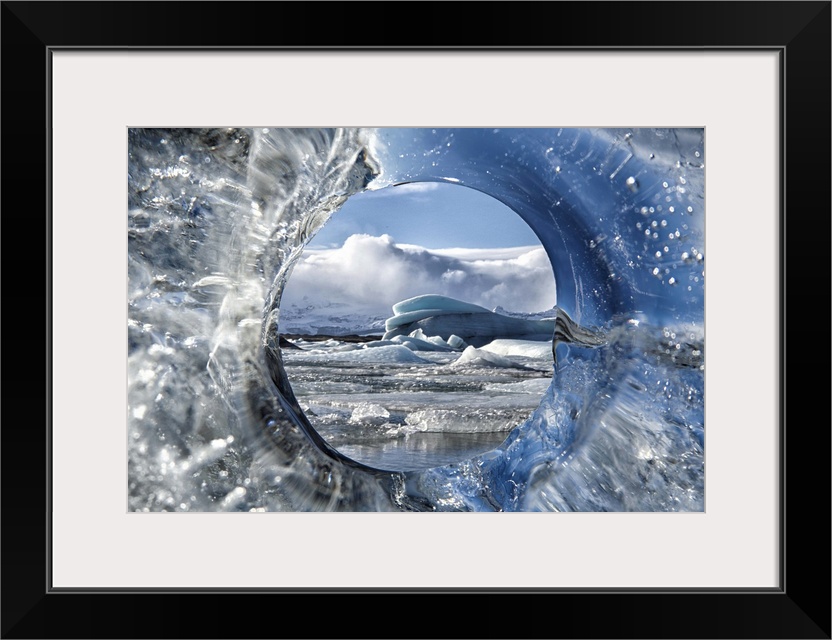 Looking through a hole of ice from a glacier.