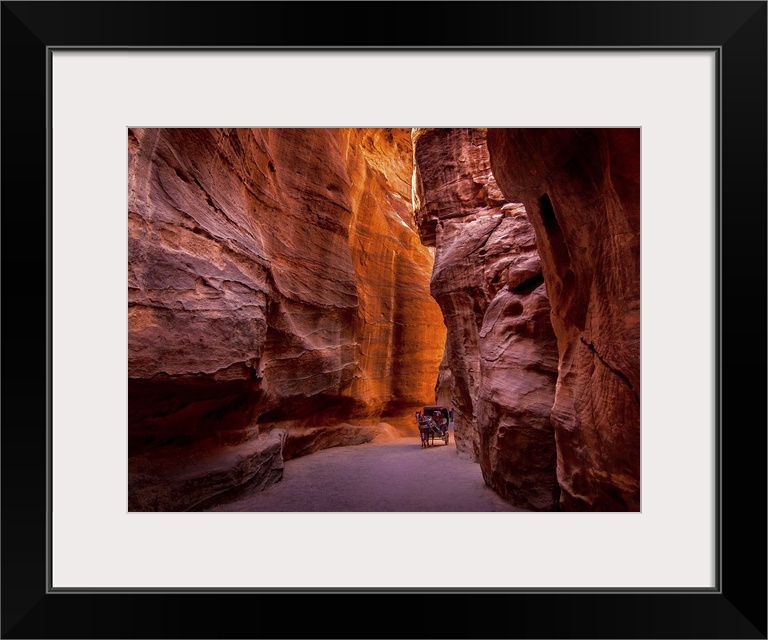 Red rock canyon walls in Petra, Jordan.