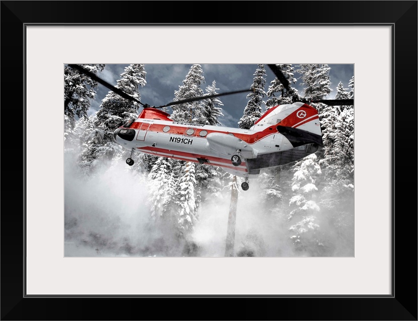 A helicopter lifts up off the ground, sending snow flying away.