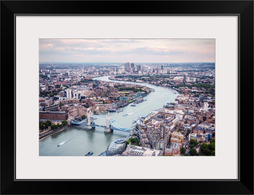 Aerial view of River Thames and Tower Bridge in London, England.