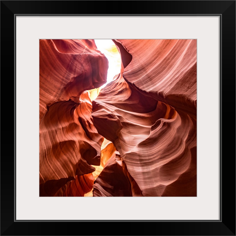 Square photograph inside of Antelope Canyon rock formation located on the Navajo Reservation in Page, Arizona with flowing...