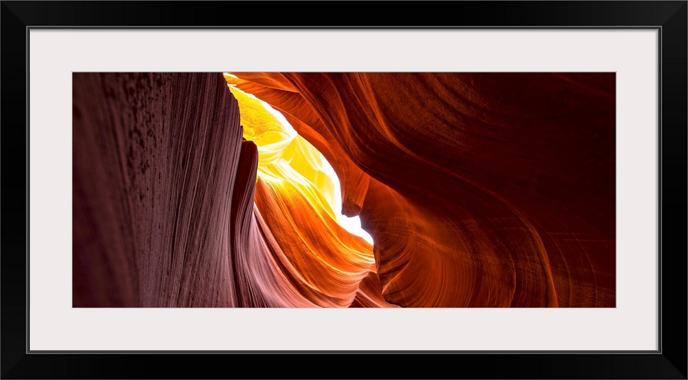 Photograph from inside of Antelope Canyon rock formation located on the Navajo Reservation in Page, Arizona with flowing s...