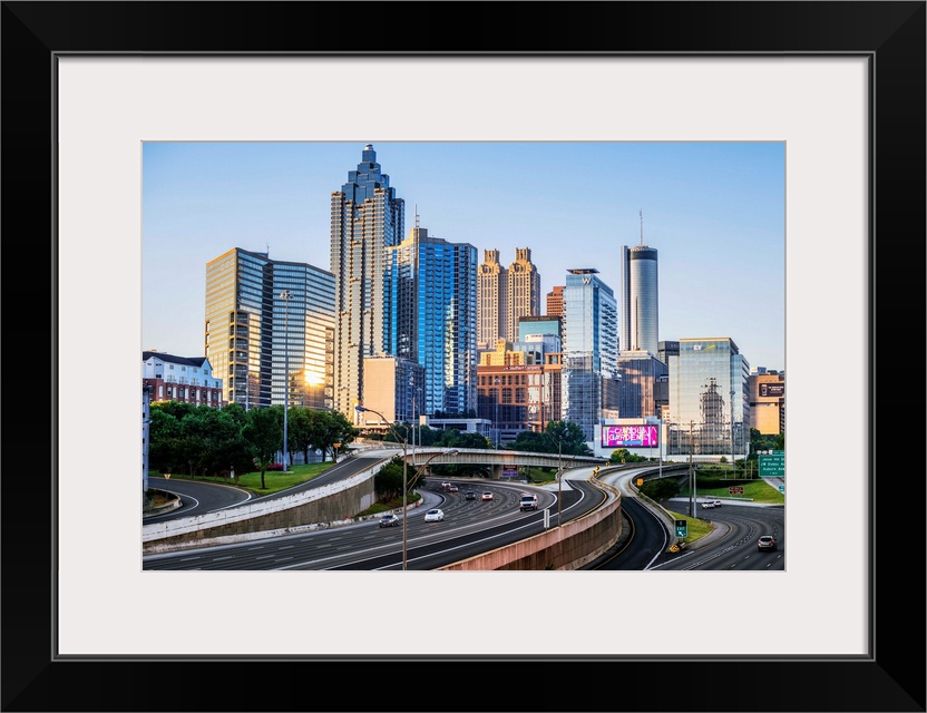 Morning sunlight reaching the skyscrapers of Atlanta, Georgia, see from the freeway.