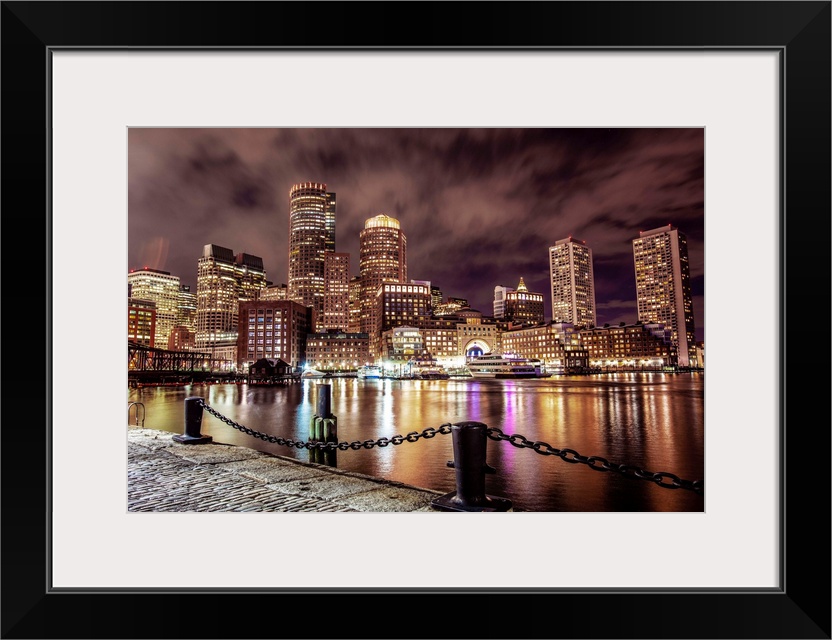 Photo of Boston city skyline and waterfront from the view of the Harborwalk.