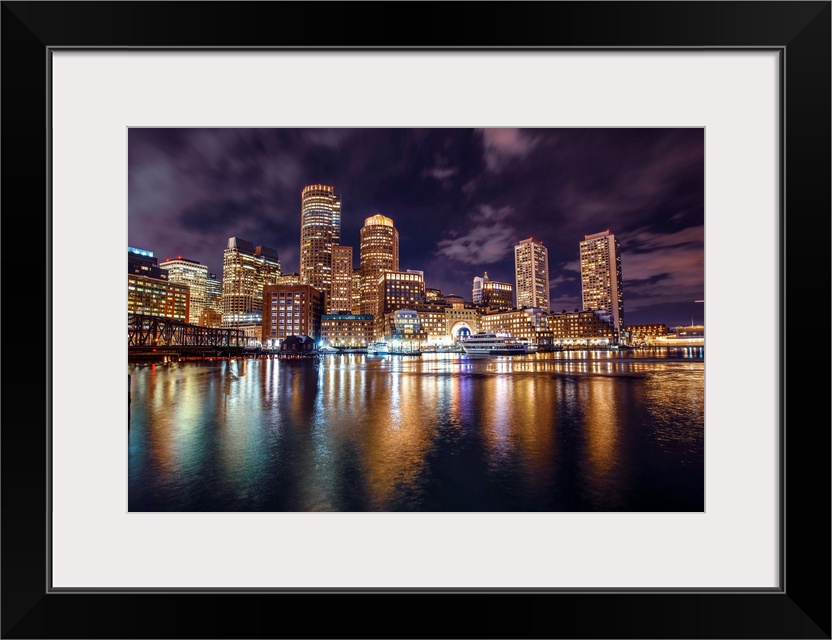 Photo of Boston city skyline and waterfront from the view of the Harborwalk.