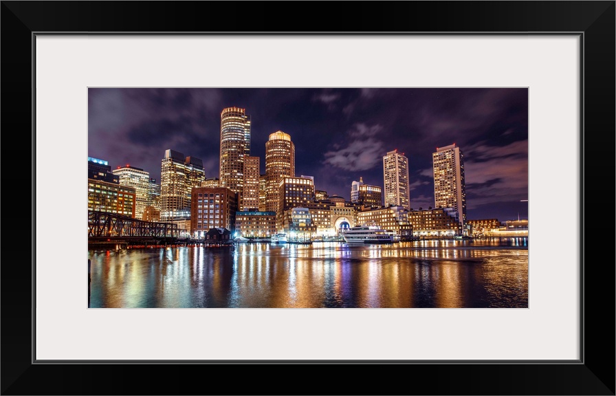 Photo of Boston city skyline and waterfront from the view of the Harborwalk.