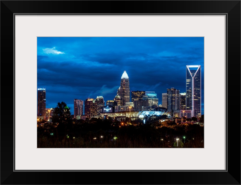 Horizontal image of the city of Charlotte, North Carolina at night.