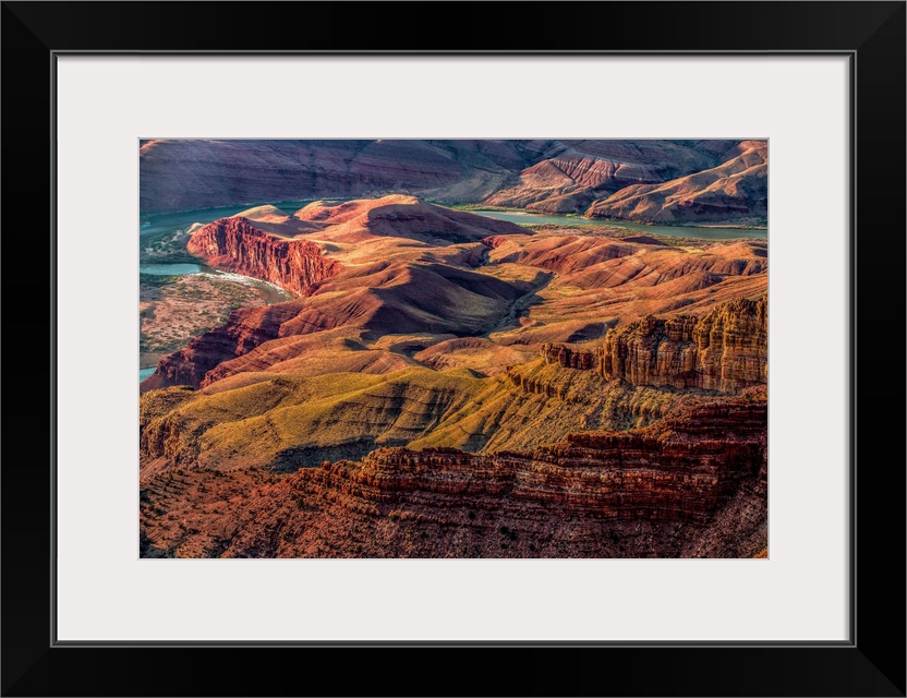 Landscape photograph of the Colorado River winding through the Grand Canyon.