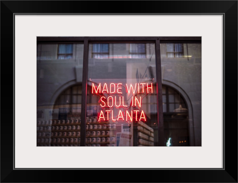 Made With Soul In Atlanta, a yellow neon sign in the window of Switchyards Downtown Club in Atlanta, Georgia.