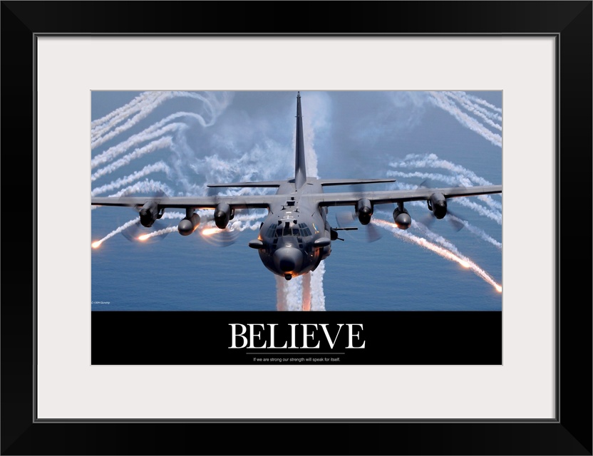 Horizontal inspirational wall hanging of an AC-130H aircraft surrounded by flares and trails of smoke as it flies over a b...