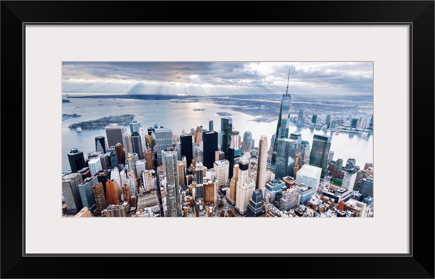 Aerial view of the skyscrapers in the Financial District at the edge of the water in New York City.