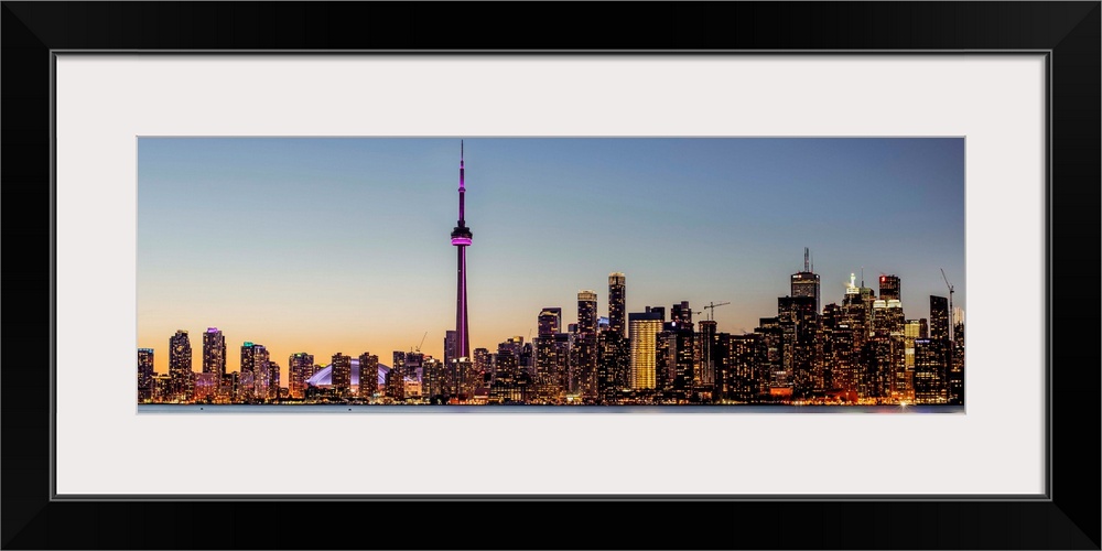 Photo of Toronto city skyline at night, Ontario, Canada.