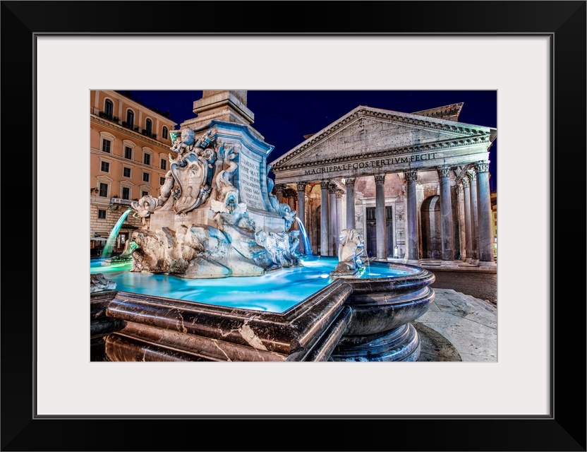 Photograph of the Pantheon Fountain lit up at night in Piazza della Rotond, Rome.