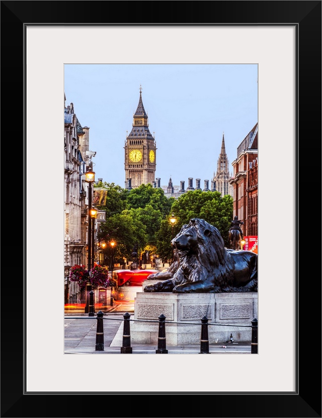 Photograph of Trafalgar Square with the iconic Trafalgar Lions in the foreground and Big Ben in the background.