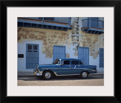 An old blue Chevrolet car parked in a street in Old Havana, Cuba, Caribbean