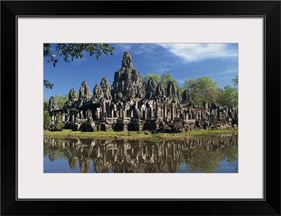 Bayon Temple reflected in water at Angkor, Siem Reap, Cambodia, Indochina