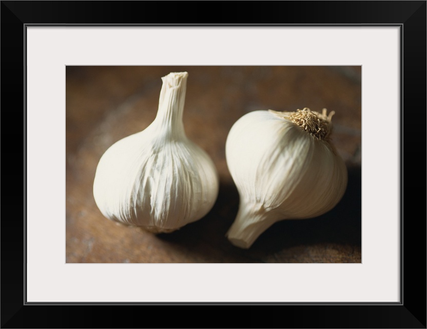 Close-up of two heads of garlic