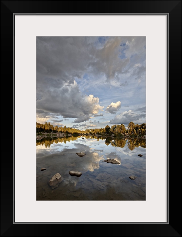 Clouds at sunset reflected in an unnamed lake, Shoshone National Forest, Wyoming