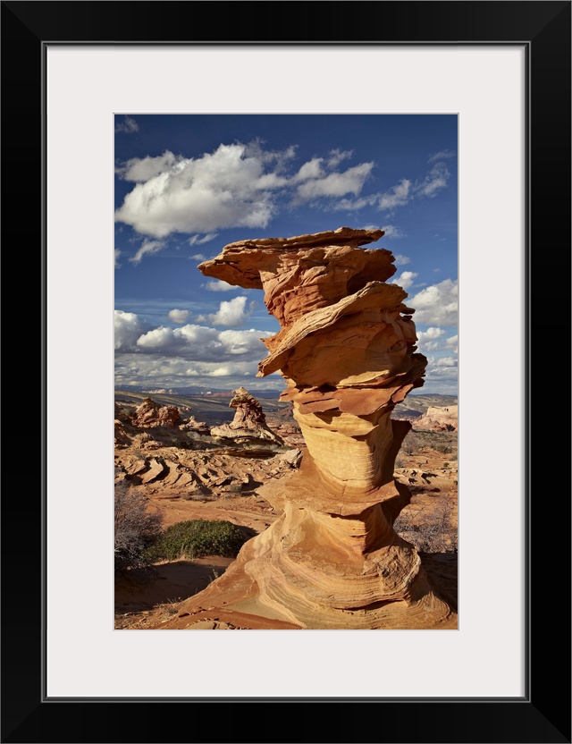 Layered sandstone column under clouds, Coyote Buttes Wilderness, Vermillion Cliffs National Monument, Arizona, United Stat...