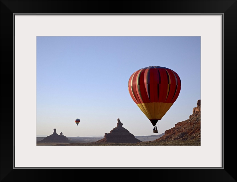 Formations in Valley of the Gods with two hot air balloons, near Mexican Hat, Utah