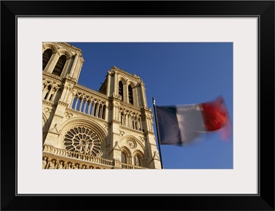French flag and Notre Dame de Paris, Christian cathedral, Paris, France