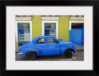 Old Car Parked In Front Of A Colorful Building, Old Havana, Cuba