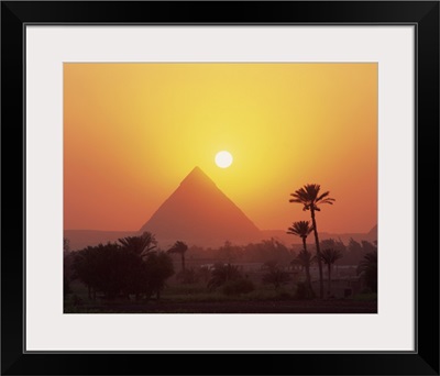 Pyramid silhouetted at sunset, Giza, Cairo, Egypt, Africa