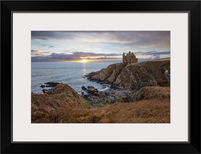 Ruins Of Dunskey Castle On Rugged Coastline At Sunset, Scotland