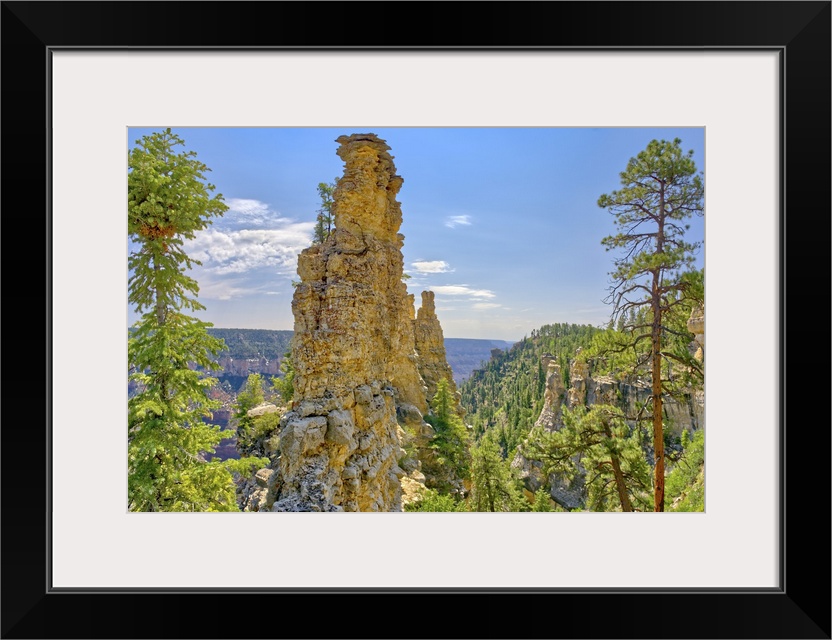 Large rock spires on the cliff of Transept Canyon along the Widforss Trail at Grand Canyon North Rim, UNESCO World Heritag...