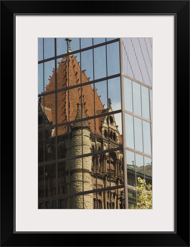 Trinity Church reflected in glass windows of the Hancock Tower, Boston, MA, USA